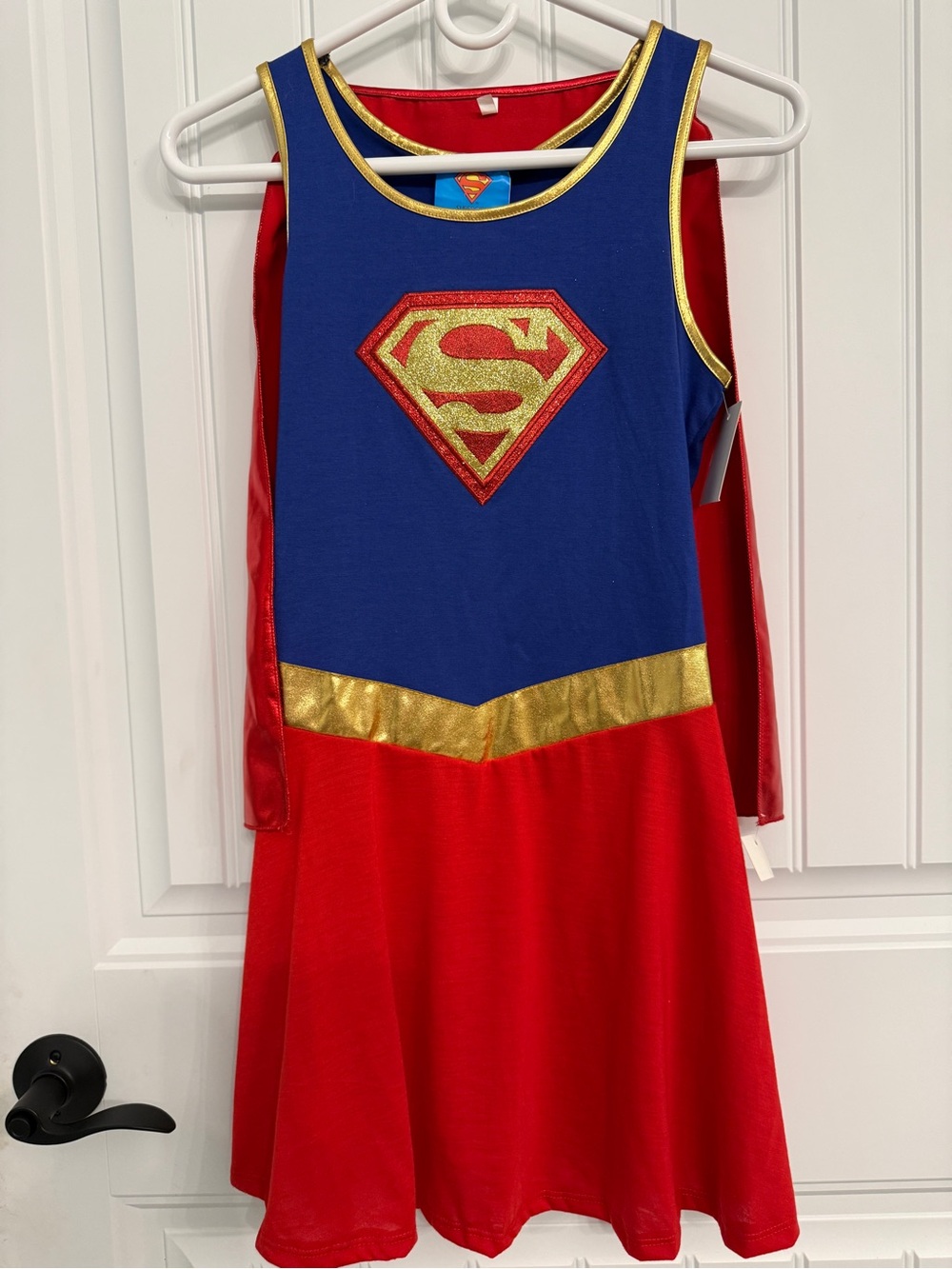 New Super girl/woman costume size women’s small.  Come with dress & cape.